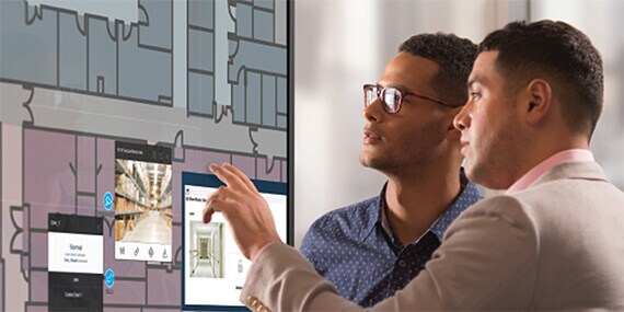 Two workers discussing